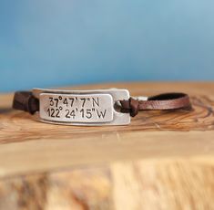 This charming leather coordinate bracelet is the perfect gift for grads this year as they head out for a brave new adventure. Features & Measurements: ♥ Hand Cast Pewter Rectangle: 1 1/8"x 1/2" ( fine, acid-free pewter) ♥ 3mm Deerskin Leather - choose your color ♥ .999 Silver Plated Pewter Components Everyday Adjustable Leather Bracelet Hand Stamped, Inspirational Adjustable Jewelry With Engraving Option, Adjustable Everyday Leather Bracelet, Silver Leather Bracelet With Hand Stamped Details For Everyday, Adjustable Stamped Leather Bracelet For Everyday, Adjustable Engraved Jewelry For Everyday, Brown Hand Stamped Bracelets For Everyday, Adjustable Meaningful Jewelry With Engraving Option, Meaningful Adjustable Jewelry With Engraving Option