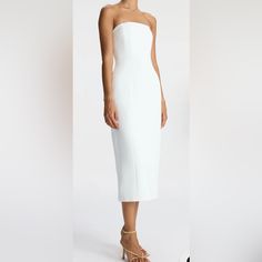 The Elizabeth Dress, A Part Of A.L.C.'S Signature Collection, Is Impeccably Cut From Structured Winter White Fabric. This Midi Silhouette Is Strapless, Featuring Pockets And Darted Seams For A Feminine Fit. We Recommend To Size Up One From Your Typical Size White Knee-length Strapless Formal Dress, Summer Midi Dress With Straight Neckline For Dinner, Strapless Dress With Fitted Bodice For Brunch, Summer Strapless Fitted Dinner Dress, Spring Dinner Dress With Straight Neckline, Summer Strapless Fitted Dress For Dinner, Fitted Strapless Dress For Summer Dinner, White Strapless Knee-length Evening Dress, Summer Dinner Strapless Fitted Dress