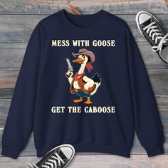 Get ready to rock a hilarious and unique look with our Silly Goose Western-themed sweatshirts and hoodies! 🤠🦢 These comfy, eye-catching designs are perfect for anyone who loves to laugh and stand out from the crowd. Whether you're a fan of memes, TikTok trends, or just appreciate a good chuckle, our silly goose gear has got you covered. Show off your wild side with a touch of Western flair that'll make you the talk of the town. These sweatshirts and hoodies are ideal for casual hangouts, game Vintage Wild West, Goose Sweatshirt, Funny Goose, Sweatshirt Western, Western Sweatshirts, Tiktok Trends, Silly Goose, Sweat Shirts, Fantastic Gifts