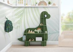 there is a green dinosaur book shelf in the children's room