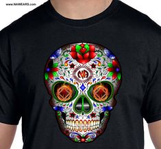 a man wearing a black t - shirt with a colorful sugar skull design on it