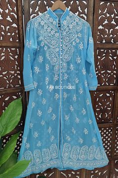 ▪ Kurti Fabric: Georgette ▪ Kurti Length: 44-46 Inches ▪ Sleeves: 3/4 Sleeves ▪ Style: Straight Kurti ▪ Occasions: Party Wear, Office Wear, Festive Wear ▪ Garment Care: Hand Wash Only ▪ Price Includes: 1x Kurti with inner Fitted Chikankari Embroidery Dress For Transitional Season, Traditional Blue Anarkali Set For Summer, Blue Traditional Salwar Kameez For Summer, Traditional Blue Salwar Kameez For Summer, Fitted Long Kurta With Floral Embroidery, Summer Anarkali Salwar Kameez With Intricate Embroidery, Traditional Anarkali Set With Intricate Embroidery For Summer, Anarkali Set With Intricate Embroidery For Festivals, Summer Anarkali Set With Intricate Embroidery