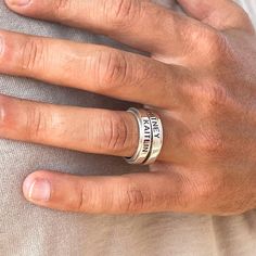 ♥ A new personalized piece of jewelry from BUNIQE: Custom Engraved Fidget Spinner Ring, handcrafted from 925 Solid Sterling Silver.  * This sophisticated piece is a stylish accessory and personalized spinning band, perfect for His and her Valentine's Day.  * Engrave your family kids' names, a particular date, or any custom engraving, including your secret message, initials, or a significant date, to make this ring a truly sentimental gift.  * Whether it's for your best dad or loving mom, this ri Meaningful Silver Stackable Jewelry, Customizable Silver Promise Ring, Meaningful Engraved Silver Rings, Silver Jewelry For Promise, Meaningful Silver Jewelry For Promise, Sterling Silver White Gold Jewelry With Engraved Text, Adjustable Sterling Silver Jewelry With Engraved Text, Customizable Adjustable Sterling Silver Engraved Ring, Adjustable Customizable Engraved Sterling Silver Ring