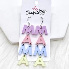 New mom? Baby shower? These are the cutest earrings to honor that most special lady! Lightweight, pastel acrylic letters. 2.75" x .75" Stainless Steel & Hypoallergenic All settings are lead and nickel free Cheap Nickel-free Earrings For Mother's Day, Cheap Mother's Day Earrings, Cheap Custom Name Earrings For Mother's Day, Cute Multicolor Earrings For Mother's Day, Playful Personalized Pink Earrings, Personalized Earrings For Mother's Day, Playful Multicolor Personalized Earrings, Playful Personalized Multicolor Earrings, Trendy Personalized Earrings For Birthday