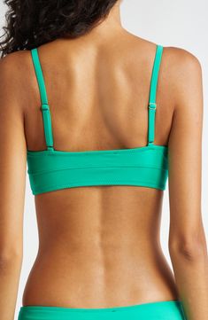 Channel bold energy in this bikini top featuring supportive underwire and adjustable straps for a personalized fit. Clasps at back Adjustable straps 74% polyamide, 26% elastane Hand wash, dry flat Made in Portugal Strappy Nylon Swimwear With Built-in Bra, Sunbathing Tankini With Adjustable Straps, Green Triangle Top Swimwear With Straps, Vacation Swimwear With Built-in Bra And Tank Straps, Green Bandeau Swimwear With Removable Bra Pads, Strappy Fitted Swimwear With Padded Cups, Fitted Strappy Swimwear With Padded Cups, Green Underwire Tankini With Built-in Bra, Spaghetti Strap Swimwear With Padded Cups For Sunbathing