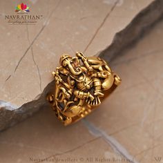 Carry your faith and devotion wherever you go with this Lord Ganesh ring . We are open from 10 am to 8 pm 𝐋 𝐨 𝐜 𝐚 𝐭 𝐢 𝐨 𝐧 : M.G. ROAD, JAYANAGAR, RAJAJINAGAR, C T STREET For Enquiry: +91 9108701007 #navrathan #navrathanjewellers #jewelers #jewellerydesign #JewelleryAddicts #jewellerylovers #expressyourself #jewelryaddict #classyjewelry #luxuryjewelry #timeless #grace #signature #opulence #antiquebangles #brides #signaturecampaign #luxury #bespoke #signaturejewellery #emeralds #antiquejew Mens Gold Ring Vintage, Gold Jewelry Outfits, Mens Gold Rings, Indian Jewelry Sets, Gold Ornaments, Classy Jewelry, Mens Gold, Jewellery Designs, Ring Vintage