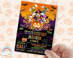 a mickey mouse halloween party with pumpkins and skulls