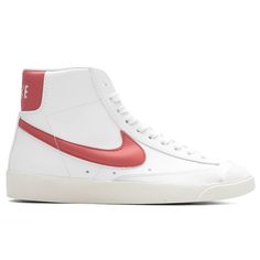 The Nike Blazer Mid Vintage updates the iconic basketball shoe with premium material all while keeping the original shape and feel that we have come to love throughout the years. Pictured is the Nike Women's Blazer Mid '77 in White/Adobe/Red Stardust. Leather uppers Exposed foam tongue Rubber outsole Style no: FZ3626-100 Throwback Mid-top High-top Sneakers With Gum Sole, Retro Custom Sneakers With Gum Sole For Sports, White Throwback High-top Custom Sneakers, White Throwback High-top Sneakers With Rubber Sole, Throwback Mid-top Basketball Shoes With Gum Sole, Throwback High-top Sneakers With Gum Sole, Retro Red Basketball Shoes With Rubber Sole, Throwback Skate Shoes With Gum Sole And Round Toe, Throwback Nike High-top Sneakers