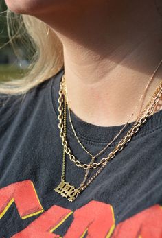 This necklace makes us feel like it’s 2004 and we are trying to pick the best necklace to match with our Juicy sweatsuit. This necklace is so in right now and is perfect for adding a little Y2K nostalgia to your wardrobe! 16" Gold plated. Juicy Sweatsuit, Best Necklace, Year Necklace, Y2k Nostalgia, Gothic Style, Gothic Fashion, Feel Like, Right Now, Gold Plate