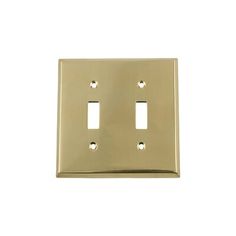 two toggles are mounted on the side of a light switch cover in an antique brass finish