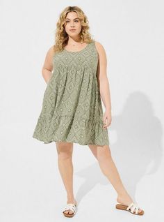 FIT Model is 5'9” wearing size 1. Flowy a-line silhouette. Measures 40” from shoulder (size 2). MATERIALS + CARE Challis woven fabric: New, improved, and loved by all—and still lightweight, drapey, and (really! ) machine-washable. . Stretch level: None. . 72% viscose, 28% lyocell. Machine wash cold. Line dry. Imported. DETAILS Scooped crew neckline. . Sleeveless. . Tiered skirt. Print detail. . The best plus size women's mini challis tiered tank dress dresses in diamond tribal made of washchalli Black Beachwear, Skirt Print, Sheer Shorts, Easter Outfit, Tier Skirt, Urban Outfits, Dress With Cardigan, Tiered Skirt, Spring 2024