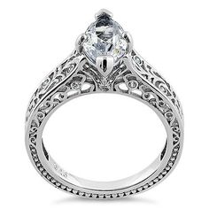 Top of ring height: 13.4mm

    Top of ring width: 8mm

    Band width: 4.4mm

    Shank width: 2.5mm

  
     Stone material: clear cubic zirconia

    Center stone size: 13mm x 6.5mm

    Stone shape: marquise & round cut

    Center stone carat   weight: 2.11 ct.

    Total number of stones: 7

    Stone setting: prong setting

 
    Metal: 925 sterling silver

    Plating: rhodium plated   (what is rhodium?) What is Rhodium? 
 
  If you're not familiar with Rhodium, it's a rare Cubic Zirconia Marquise Cut Ring With Center Stone, Marquise Cubic Zirconia Ring With Diamond Cut, Diamond White Marquise Diamond Ring With Accent Stones, Marquise Diamond White Ring With Accent Stones, Marquise Cut Cubic Zirconia Rings Diamond Cut, Cubic Zirconia Diamond Ring With Accent Stones, Marquise Cut, Cubic Zirconia Marquise Diamond Ring With Center Stone, Silver Marquise Solitaire Diamond Ring, Marquise Cubic Zirconia Rings With Accent Stones