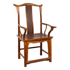 a wooden chair with leather seat and armrests