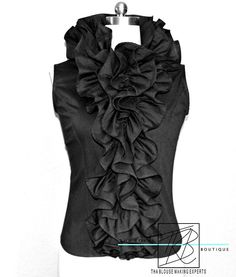 Custom Ruffle Blouse with a sophisticated and classy edge. The blouse can be worn as a blouse or layered open with another blouse underneath. It would also look great layered under a blazer. If you love attention grabbers this blouse will defiantly have all eyes on you The blouse features: * Sleeveless (Great for those really hot days) * Front layered ruffles * Front separating zipper fastening * Can be worn as a blouse or a Jacket **If you would like your blouse made to your measurements please Elegant Spring Vest With Ruffles, Chic Ruffled Vest, Elegant Party Vest Blouse, Elegant Party Blouse Vest, Chic Fitted Vest With Ruffles, Elegant Party Blouse With Vest Detail, Chic Sleeveless Blouse With Ruffles, Fitted Ruffled Sleeveless Blouse Vest, Fitted Sleeveless Blouse Vest With Ruffles