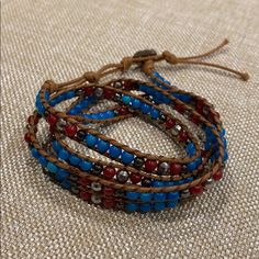 Nwot! Women’s Wrap Around Beaded Bracelet Gorgeous Wrap Bracelet In A Palette Of Colors That Includes Different Shades Of Red As Well As Blue, Aqua, Turquoise And Copper-Color Beads. The Bracelet Is Designed To Wrap Around The Wrist Approximately Five Times. Avoid Contact With Water. Button Clasp. Will Wrap With Care Wrap Bracelet With Faceted Round Beads For Festival, Faceted Beads Wrap Bracelet For Festivals, Wrap Bracelet With Faceted Beads For Festivals, Bohemian Blue Wrap Bracelet With Colorful Beads, Blue Bohemian Wrap Bracelet With Colorful Beads, Adjustable Blue Wrap Bracelet With Faceted Beads, Bohemian Blue Beaded Bracelets With Faceted Beads, Blue Bohemian Beaded Bracelets With Faceted Beads, Bohemian Wrap Bracelet With Faceted Round Beads