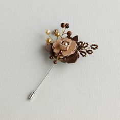 Leather flower Lover pin Handmade Hat pin beaded flower brooch can be a beautiful Wedding boutonniere lapel pin. The leather flower brooch made with faux Pearl beads, Sunstone beads and seed beads.  The length of the leather flower lapel pin  is 4.0 inches   Lapel pin leather Diameter is approximately 2.0 inches Color - beige, khaki, brown Exquisite leather brooch is perfect men flower lapel pin for any clothes. Add class to your look with this handmade plant brooch! This branch flower pin/ beaded shawl pin can be a beautiful gift!  More brooches and pins can see here:  https://etsy.me/3eBaTnB Beaded Bouquet, Brooch Wedding, Flower Lapel, Wedding Boutonniere, Flower Lapel Pin, Handmade Plant, Jewelry Brooch, Leather Flower, Brooch Bouquets