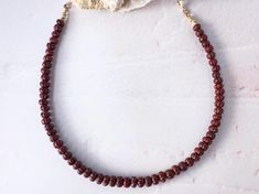 This exquisite hand-carved red jasper gemstone necklace.  The vibrant red jasper gemstone radiates warmth and vitality, making it a perfect accessory for any outfit. Whether you're seeking a touch of elegance or a statement piece, this necklace will turn heads. Elevate your style with the mesmerizing beauty of this hand-carved red jasper gemstone necklace.    About the stones: 🌙 5-9mm Gemstones 🌙 Hand Carved 🌙 Aka Pumpkin, Melon bead 🌙17inches  🌙 Wear as a Layer of Statement Necklace TRIO B Red Pumpkin, Red Pumpkins, Southern Art, Mesmerizing Beauty, Jasper Necklace, Red Jasper, Coin Necklace, Jasper Gemstone, Opal Necklace