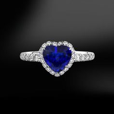 Heart Shape CEYLON SAPPHIRE & Diamond Gold RingThis ring is handmade like all our products, with accuracy by our goldsmiths with over 40 years experience. Included in the price is the opportunity to add a personalised touch by engraving your MR jewellery and make it uniquely yours.ITEM INFORMATION-SapphireWeight:  1.05 carats or 1.92 caratsShape: HeartOrigin: Ceylon (Sri Lanka)-DiamondsColour Grade: GClarity: VVSCut Grade: Excellent-Gold 18KCertificate avaialble on request.All ring sizes ava Gia Certified Heart Cut Diamond Ring, Heart-shaped Gia Certified Ring For Anniversary, Gia Certified Heart Shaped Anniversary Ring, Gia Certified Heart-shaped Ring For Anniversary, Gia Certified Heart Diamond Rings, Gia Certified Heart-shaped Diamond Jewelry, Gia Certified Heart Shaped Fine Jewelry Ring, Luxury Heart Cut Gia Certified Jewelry, Luxury Heart Cut Gia Certified Rings