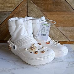 Crocs Boots White Color New With Tags Size 8 Gold Charms Details Puffy Inside Please See Pics For Details And Condition New With No Box Crocs With Gold Charms, Shoes Crocs, Crocs Boots, Boots White, Gold Charms, Women's Crocs, Crocs Shoes, Gold Charm, White Color