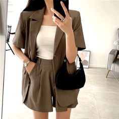 Hey everyone! Special picks outfit Ideas for every type of festive occasion. Here for more >>> https://chyclothing.storenvy.com/collections/988299-pants/products/36574931-stunning-executive-office-blazer-with-matching-pleated-wide-leg-shorts-pants Suits For Women Shorts, Short Sleeve Blazer Outfit, Shorts And Blazer Outfit, Blazer With Shorts, Kim Wedding, Linen Outfits, Fits Ideas, Suit Shorts, Pick Outfits