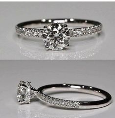 an image of a diamond ring with diamonds on the side and in the middle, it is white gold