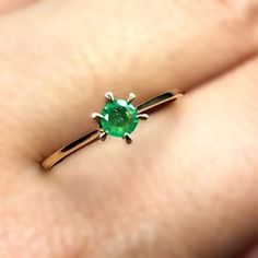 Welcome to Elegant Art Jewelry!  Material: 18k yellow Gold Stone: Emerald Stone Weight: 0.28 Ct Stone Size:. 3mm×3mm Stone Origin: Zambian Stone Cut: Round Cut Personalization: 9K/14K/24K/GOLD/SILVER/PLATINUM/ROSE-GOLD/WHITE GOLD. (Contact me)  Emerald Ring, Emerald Cuff Ring, 18k Yellow Gold Ring, Round Shape Ring, Emerald Ring, Emerald Engagement, Open Design Ring, Emerald Round, Emerald Natural, Green Emerald, Green Gemstone, Gemstone Ring, Simple Emerald Ring, Green Emerald, Natural Emerald, 14k Gold Emerald Ring With Brilliant Cut For Promise, Green Ring With Single Diamond In Fine Jewelry Style, Green Diamond Ring In Fine Jewelry Style, Emerald Ring With Single Diamond For Anniversary, Fine Jewelry Emerald Ring With Single Diamond, Green 14k Gold Diamond Ring With Round Band, 14k Gold Green Diamond Ring With Round Band, Green Diamond Ring With 14k Gold Round Band, Green Wedding Ring With Single Diamond