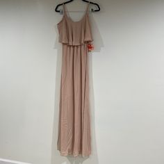 The Caitlin Ruffle Maxi Dress Dusty Blush Crisp And Flows From Top To Bottom. She's Extremely Versatile, So Wear Her As A Classic Spaghetti Strap Or Make Her Into A Cold Shoulder! Fitted Beige Maxi Dress With Ruffles, Summer Fitted Bridesmaid Ruffle Dress, Spring Bridesmaid Fitted Ruffle Dress, Spring Bridesmaid Ruffle Dress With Ruffle Hem, Spring Bridesmaid Ruffle Dress, Summer Bridesmaid Ruffle Dress, Bridesmaid Maxi Dress With Ruffle Hem, Fitted Floor-length Ruffle Dress For Spring, Beige Flowy Tiered Maxi Dress