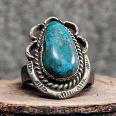 Turquoise ring - beautiful large cabochon on oval twist and hand stamped base - Size 6.5. Hallmark by Annie Chapo. Our entire collection has a Satisfaction guarantee. If your product doesn't fit right or for whatever reason, you have 30 days to return your undamaged item for a refund. Heirloom Oval Turquoise Cabochon Ring, Handmade Classic Oval Turquoise Ring, Vintage Turquoise Ring With Oval Cabochon, Adjustable Oval Turquoise Ring With Patina, Turquoise Oval Ring With Patina, Oval Turquoise Ring With Patina, Vintage Oval Ring With Patina, Vintage Turquoise Oval Ring, Vintage Turquoise Ring With Large Oval Stone