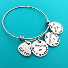 You are stronger bracelet Personalized Adjustable Charm Necklace For Best Friend, Personalized Adjustable Charm Necklaces For Best Friend Gift, Adjustable Stainless Steel Charm Necklace For Mother's Day, Mother's Day Adjustable Metal Charm Necklaces, Adjustable Metal Charm Necklaces For Mother's Day, Personalized Silver Charms For Best Friend Gift, Personalized Adjustable Metal Charm Necklaces, Personalized Adjustable Metal Charm Necklace, Adjustable Stamped Charm Necklace For Personalized Gift