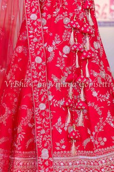 Expertly crafted from luxurious raw silk, this Scarlet Red Embroidered Lehenga Set features intricate embroidery, including resham zari and zardosi details. With its elegant design and beautiful craftsmanship, it's the perfect choice for any bride looking for a stunning and sophisticated look on her special day. Elevate your style and stand out with this breathtaking lehenga set. Silk Lehenga Blouse, Zardosi Embroidery, Raw Silk Lehenga, Embroidered Lehenga, Lehenga Blouse, Fusion Wedding, Wedding Lehenga, Silk Lehenga, Net Dupatta