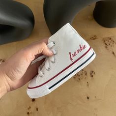 These are the coolest sneakers ever and make the best gift. They come with a beautiful subtle monogram or name printed on the side of the left shoe in a deep red on the white converse and white on the navy converse. I do have quite a few sizes available in stock, so if you're in a rush let me know and I can tell you if shipping/processing time will be even faster than listed.  Incredible birthday, Christmas, new baby gift. Customizable Lace-up Sneakers For Gift, White Letter Print Lace-up Sneakers, Customizable White Casual Sneakers, White Custom Lace-up Sneakers As Gift, Sporty Low-top Sneakers Gift, White High-top Sneakers For Birthday, White Lace-up Custom Sneakers For Gift, White Lace-up Custom Sneakers As Gift, White Low-top Sneakers As Gift