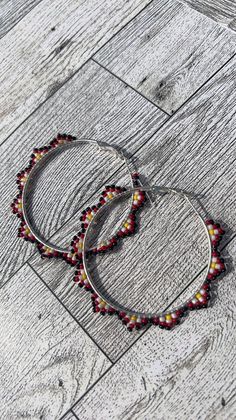 Hand beaded earrings Round Beaded Chain Earrings Gift, Round Beaded Chain Earrings For Gift, Elegant Hoop Earrings With Colorful Beads, Red Beaded Hoop Jewelry, Silver Beaded Circular Jewelry, Silver Circular Beaded Jewelry, Silver Hoop Beaded Jewelry, Silver Beaded Hoop Jewelry, Silver Beaded Round Hoop Earrings