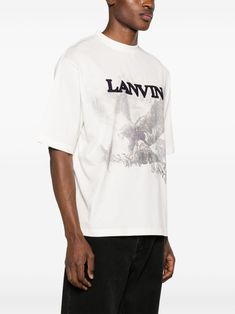 Find LANVIN X Future Eagle-print Cotton T-shirt on Editorialist. white/black cotton jersey texture embroidered logo to the front graphic print to the front crew neck short sleeves straight hem When buying this unisex item, keep in mind that it is graded in standard men's sizing. Eagle Print, City Shorts, Versace Outfit, Balenciaga Triple S, Custom Watch, Nike Air Max 97, Summer Beach Wear, Light Jacket, Lanvin