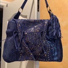 Beautiful Blue With Gold Bag. Brand New. Luxury Blue Bucket Bag With Double Handle, Luxury Blue Bucket Bag With Top Carry Handle, Luxury Blue Shoulder Bucket Bag, Luxury Blue Top Handle Hobo Bag, Luxury Blue Hobo Bag With Top Handle, Luxury Blue Bucket Bag, Luxury Blue Hobo Bag For Travel, Luxury Blue Bag For Everyday Use, Luxury Blue Pouch Satchel