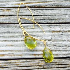 These green amethyst earrings created by Jewelry by CARMAL are made of: genuine green amethyst faceted tear drop gemstones, gold vermeil: wire and earring hook findings. These earrings measure 2 1/4 inches in length. See more dangle earrings: http://www.etsy.com/shop/jewelrybycarmal?section_id=8002052 All of our jewelry comes wrapped and ready for gift giving! We also offer free standard shipping within the United States. We accept custom orders and would love to work with you! Please see other Gold Earrings With Green Amethyst For Gift, Gold Teardrop Peridot Earrings, Green Faceted Teardrop Earrings, Peridot Teardrop Earrings For May Birthstone, Teardrop Peridot Earrings For May Birthstone, Yellow Teardrop Faceted Earrings, Amethyst Earrings Gold, Green Amethyst Earrings, Gold Vermeil Jewelry