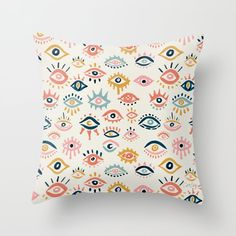 a pillow with an eye pattern on it