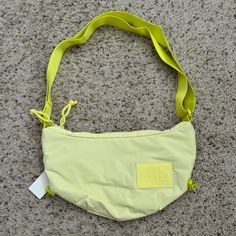 This Light-Weight Nylon, Water Repellent Crossbody Bag Is Perfect For Every Day Usage. The Large Central Zip Compartment Includes Another Mesh Zip Compartment And Other Mesh Organization Pockets. On The Backside, There Is Another Zip Compartment For Even More Storage. To Top It Off There Is An Adjustable Shoulder Strap And Bungees At The Bottom Of The Bag. Dimensions (Approximate): 7.5” X 13” X 2” Color: Sunsprite Brand New With Tags In Original Packaging. Perfect Bag For Traveling! Accepting Al The North Face Crossbody Bag For Everyday Use, The North Face Crossbody Bag With Adjustable Strap, Functional The North Face Crossbody Bag, The North Face Nylon Bags For Daily Use, Daily Use The North Face Nylon Bags, Daily Use North Face Nylon Bags, Daily Use Nylon Bags By The North Face, Daily Use Nylon The North Face Bags, Functional The North Face Shoulder Bag For Daily Use