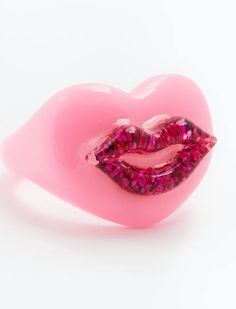 Pucker up! This Bestselling resin ring style comes in a clear rectangular, baby pink, white, and lime green base with an option of a hot pink, baby pink, pink, red, blue, or green lip charm. Hot Pink Rings, Lip Gloss Ring, Pink Jewerly, Suede Brooks, Hot Pink Accessories, Green Lips, Lip Rings, Baby Lips, White Hot