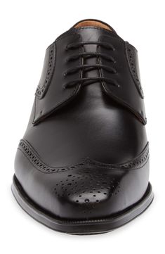 Classic broguing stipples the upper of a burnished-leather derby that adds clean grounding to your sophisticated styles. Lace-up style Cushioned footbed Leather upper and lining/rubber sole Made in Spain Timeless Calf Leather Lace-up Shoes For Formal Occasions, Elegant Fitted Derby For Semi-formal Occasions, Timeless Semi-formal Lace-up Calf Leather Shoes, Classic Wingtip Lace-up Shoes With Leather Lining, Elegant Goodyear Welted Wingtip Lace-up Shoes, Classic Wingtip Lace-up Shoes For Derby, Elegant Goodyear Welted Lace-up Derby Shoes, Elegant Goodyear Welted Lace-up Derby, Calf Leather Lace-up Dress Shoes For Semi-formal