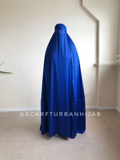 New creative design of traditional afghan burqa outfit amazing royal blue color ! This headpiece made like a skullcap at head with ties, widely and draped at the back. On sides it have a slots for arms, if you need you can use it or cover your arms inside. Especially for eyes we make a mesh insert! This item available in all colors if you need any changes please contact with me! Traditional Blue Hijab For Eid, Modest Blue Niqab For Eid, Blue Modest Khimar For Eid, Afghan Burqa, Long Hijab, Muslim Dress, Abaya Dress, For Eyes, Royal Blue Color