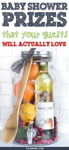 baby shower prizes that your guests will actually love are in a glass jar with a wooden spoon