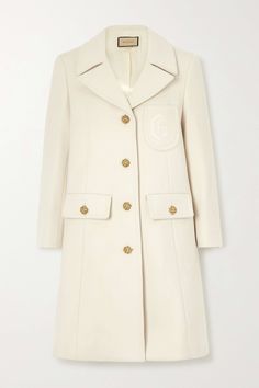 Shop GUCCI Button-embellished wool coat, Explore the latest GUCCI women's collection today on NET A PORTER Luxury Gucci Cream Outerwear, Luxury Cream Gucci Outerwear, Gucci Long Sleeve Cream Outerwear, Gucci Cream Long Sleeve Outerwear, Gucci Luxury Outerwear With Button Cuffs, Classic White Gucci Outerwear, White Gucci Outerwear For Work, Fitted Beige Gucci Outerwear, Fitted Gucci Beige Outerwear