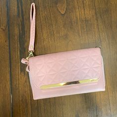 Can Be Used As A Wristlet, Shoulder Bag Or Crossbody, Length 9 Inches, Height 5 Inches, Width 1 Inch, Smoke Free Home Pink Rectangular Feminine Wallet, Pink Feminine Rectangular Wallet, Pink Phone Bag With Detachable Strap For Everyday Use, Pink Handheld Pouch For Everyday Use, Pink Rectangular Clutch With Removable Pouch, Pink Feminine Wallet For Everyday Use, Daily Use Pink Wristlet With Cell Phone Pocket, Feminine Pink Wallet For Everyday Use, Feminine Pink Wallets For Daily Use