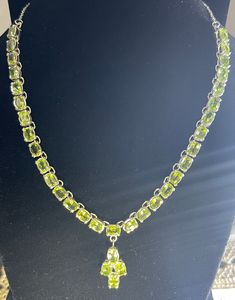 21k White Gold Tennis Natural Peridot Gemstone Necklace Material : 21k White Gold White Gold :  6 grams Gemstone : Peridot Stones : 35  Weight  : 18 Carat Free FedEx Shipping Worldwide Formal Green Citrine Jewelry, Formal Lime Green Peridot Jewelry, Formal Peridot Gemstone Necklaces, Formal Lime Green Gemstone Jewelry, Lime Green Gemstone Jewelry For Formal Occasions, Green Citrine Jewelry With Gemstone Accents, Formal Peridot Pendant Necklace, Yellow May Birthstone Jewelry, Yellow Peridot Jewelry For May Birthstone