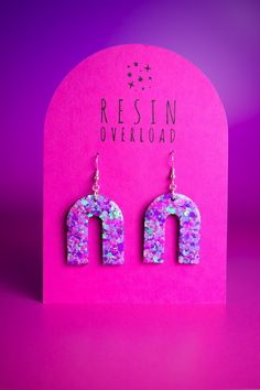 A pair of handmade glittery resin earrings, designed to make you look & feel extra. Playful, eye-catching and vibrant, perfect for festivals, parties, special occasions or just to add a touch of sparkle to your everyday look.  Each pair is meticulously crafted with love and attention to detail, ensuring that you receive a unique piece of jewellery that will make you shine.  A combination of high-quality resin and carefully selected glitter creates a mesmerising effect that catches the light and captures attention. ~ BUBBLE ARCH ~ Arch dimensions - w3 x h5cm. Silver plated fish-hook style earrings. Designed and hand crafted from my home studio in Bedfordshire, UK. All jewellery is made to order. Thanks for looking! x Blue Pastel, Pink Purple Blue, Glitter Earrings, Resin Earrings, Style Earrings, Fish Hook, Pink Purple, Unique Pieces, Blue And Purple