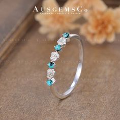 "🌸One of a Kind - No Opal is the same, get your unique fine jewelry from AUSGEMSCo. **All rings are handmade and shipped in Australia. If you don't like the stone in the picture, please contact me to change it to ANY STONE you like. Dainty Turquoise Wedding Band Women Vintage Flower Ring White Gold Stacking Ring Unique Floral Matching Band Half Eternity Anniversary Gift check the Opal and Pearl wedding band: https://www.etsy.com/listing/1449789491 🌸ITEM DETAILS Main Stone: Natural Turquoise, Round Cut Size: 1.7mm Ring Band: 1.3mm Metal Choice: 925 Sterling Silver(Plated 18K Yellow/Rose/White Gold); 10K/14K/18K Solid Gold (Rose, White, or Yellow) or Platinum 🌸Order & Rush Order: Every single piece of AUSGEMSCo jewelry is made to order, and our standard production time is 2 to 3 weeks fro Turquoise Diamond Anniversary Jewelry, Elegant Turquoise Diamond Anniversary Ring, Emerald Stackable Wedding Jewelry, Emerald Multi-stone Wedding Jewelry, Stackable Emerald Wedding Jewelry, Wedding Emerald Stackable Jewelry, White Emerald Jewelry For Wedding, White Emerald Wedding Jewelry, Turquoise Prong Setting Jewelry For Wedding