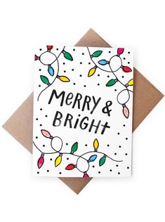 merry and bright card with lights on it