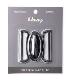 a pair of scissors in the packaging for fashion buckles