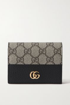 Black GG Marmont Petite textured-leather and printed coated-canvas wallet | GUCCI | NET-A-PORTER Classic Gucci Wallet For Travel, Classic Gucci Travel Wallet, Gucci Brown Wallets With Interior Card Slots, Rectangular Gucci Wallet For Travel, Brown Gucci Wallets With Interior Card Slots, Gucci Bifold Wallet For Everyday Use, Gucci Travel Wallets With Card Slots, Gucci Wallets With Card Slots For Travel, Gucci Wallet With Coin Pocket