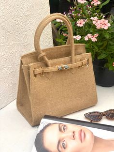 Our Jute bags are Carefully handcrafted from  sustainable natural jute material. This beautiful bags  are excellent option and eco-friendly choice for your sustainable lifestyle. With natural color hue this Bag Will fit with any occasion And Very versatile Features: * Dimensions: 30 cm  (Width) x 25cm (Height) * Woven from 100% recycled jute yarn * Inner lining made from Linen * Includes one inside pocket * Include Bag flap lid Include detachable & Adjustable long strap Please attache your Phone Number for shipping information (DHL Express requirement) Wholesale welcome Eco-friendly Ethically Sourced Straw Bag For Daily Use, Eco-friendly Linen Bags In Natural Color, Beige Jute Bags For Daily Use, Eco-friendly Rectangular Jute Bags, Eco-friendly Beige Burlap Straw Bag, Beige Burlap Eco-friendly Bag, Everyday Beige Burlap Bag, Daily Use Beige Burlap Bag, Everyday Beige Burlap Bags